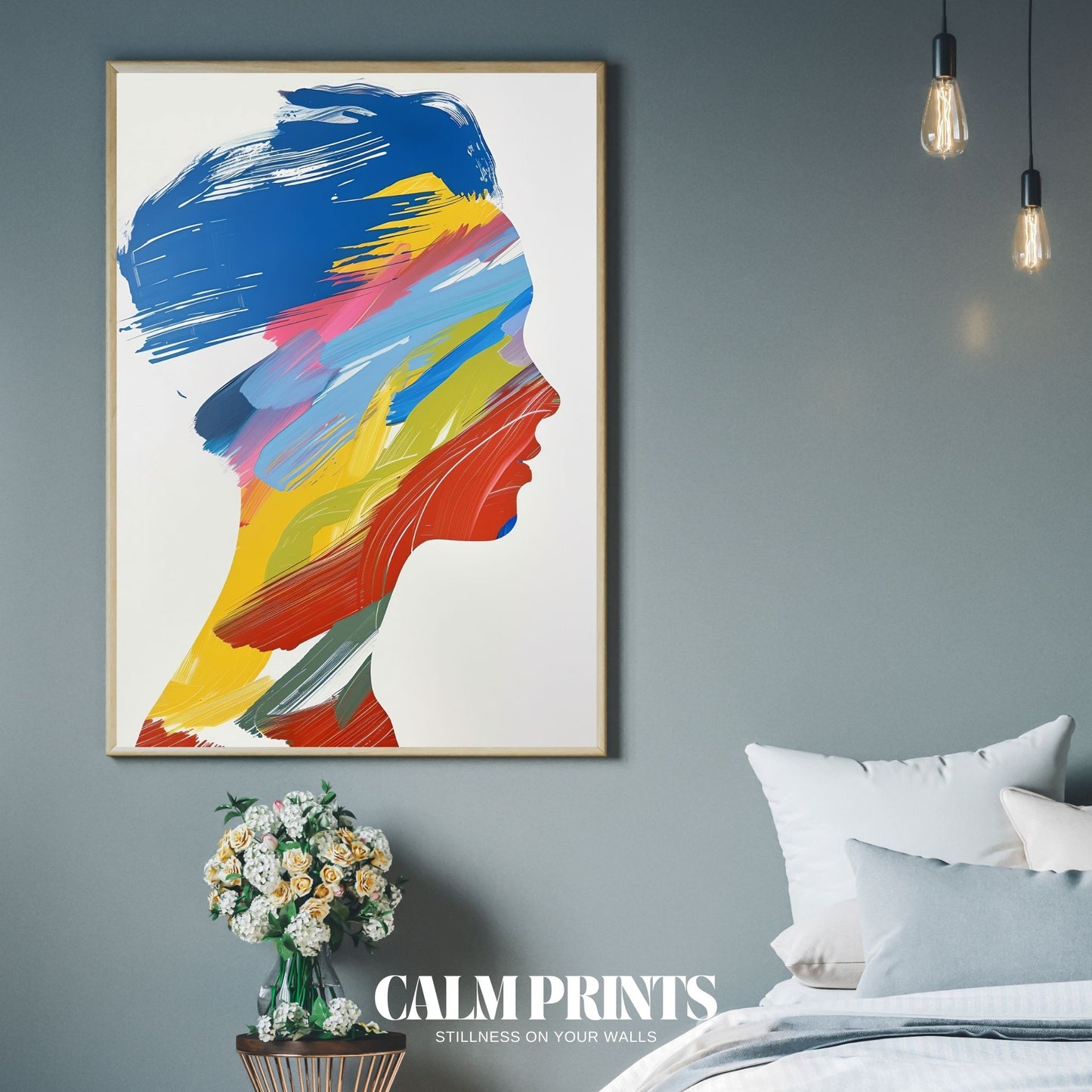 Abstract silhouette of a head composed of swirling, vivid colours
