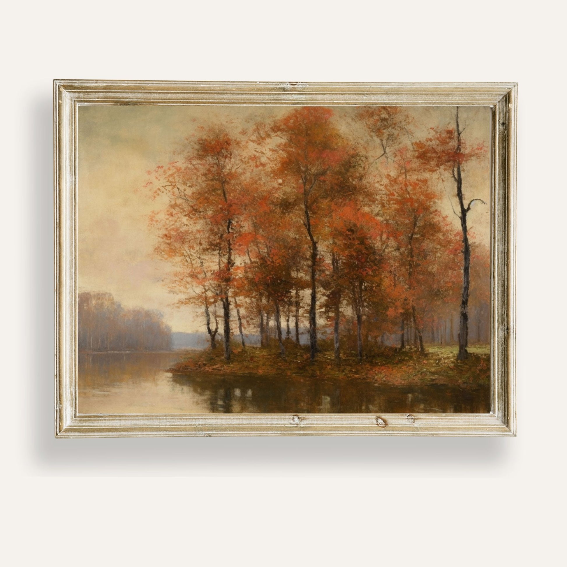 Golden autumn trees by a calm lake reflecting the quiet beauty of the season