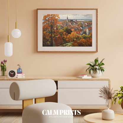 Village rooftops nestled among autumn trees in a tranquil setting
