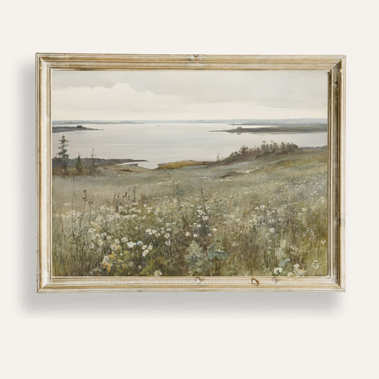 Tranquil coastal meadow with soft grasses swaying beside the sea
