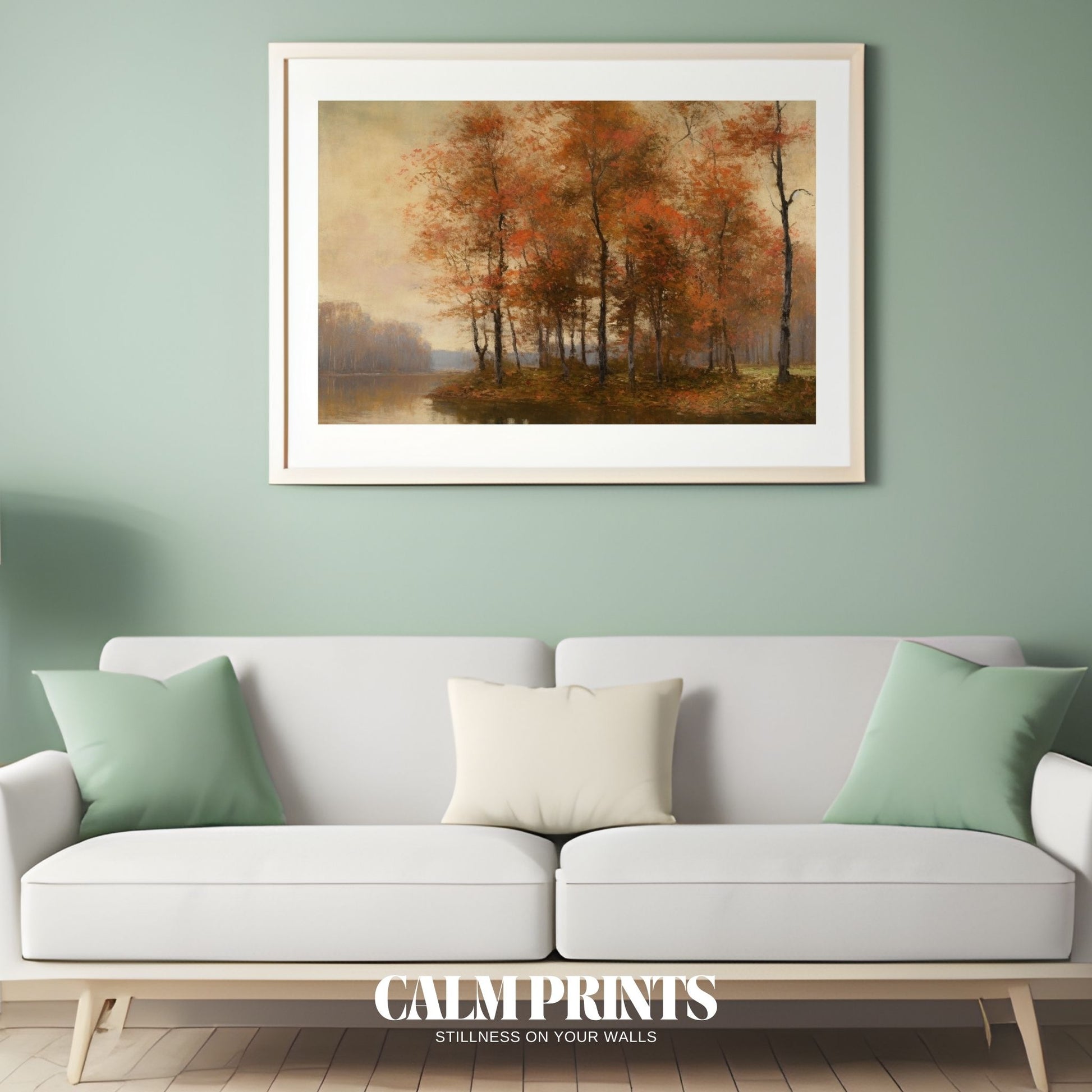 Calm lake water mirrors the warm hues of an autumn forest