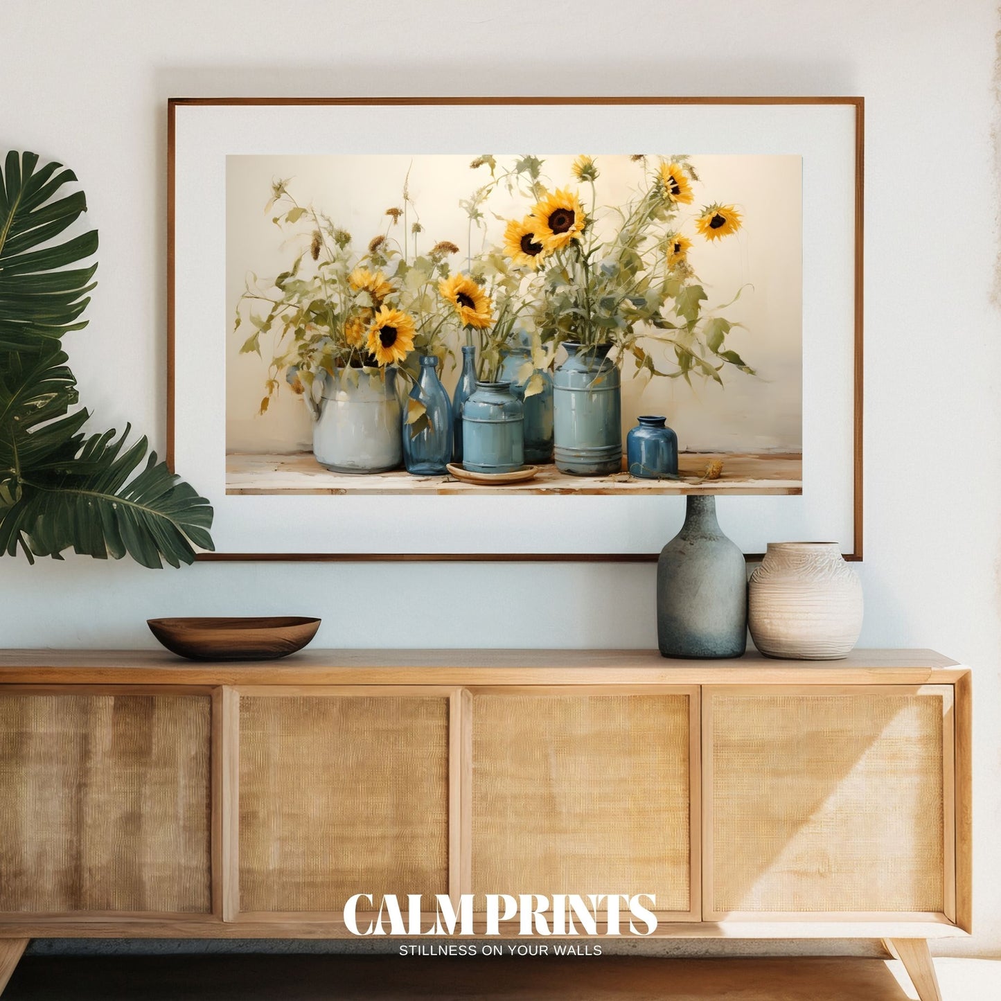 Cheerful sunflower bouquet shining in translucent blue glass vases
