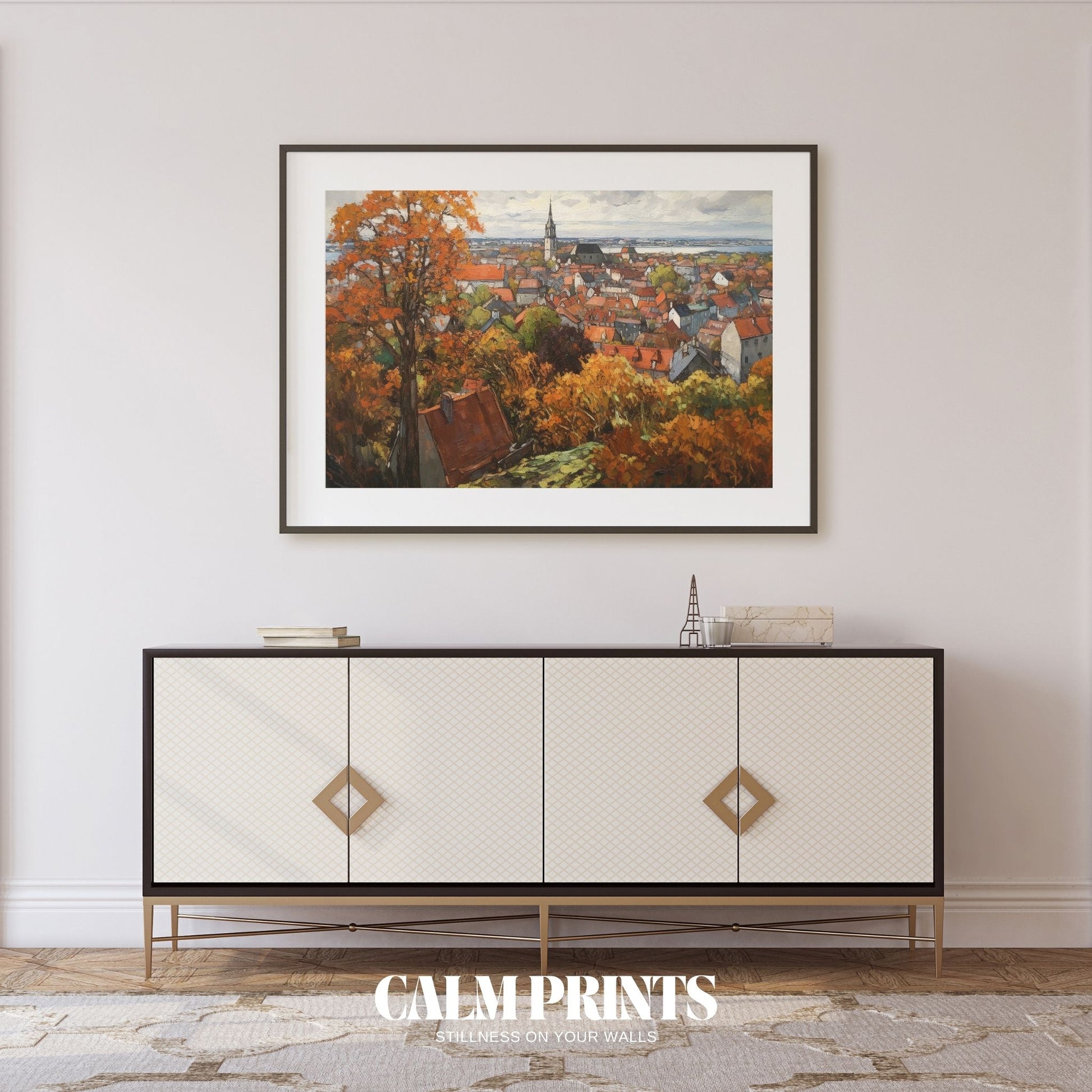 Cosy town buildings surrounded by vibrant autumn trees and soft skies
