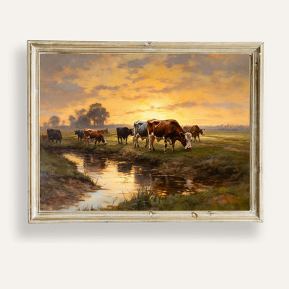 Cows peacefully grazing by a stream at sunset in a golden countryside glow
