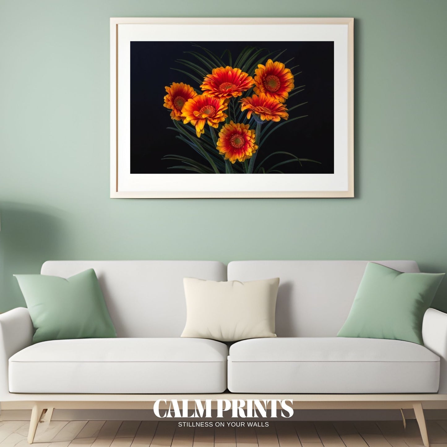 Dramatic floral composition with orange flowers on a black background
