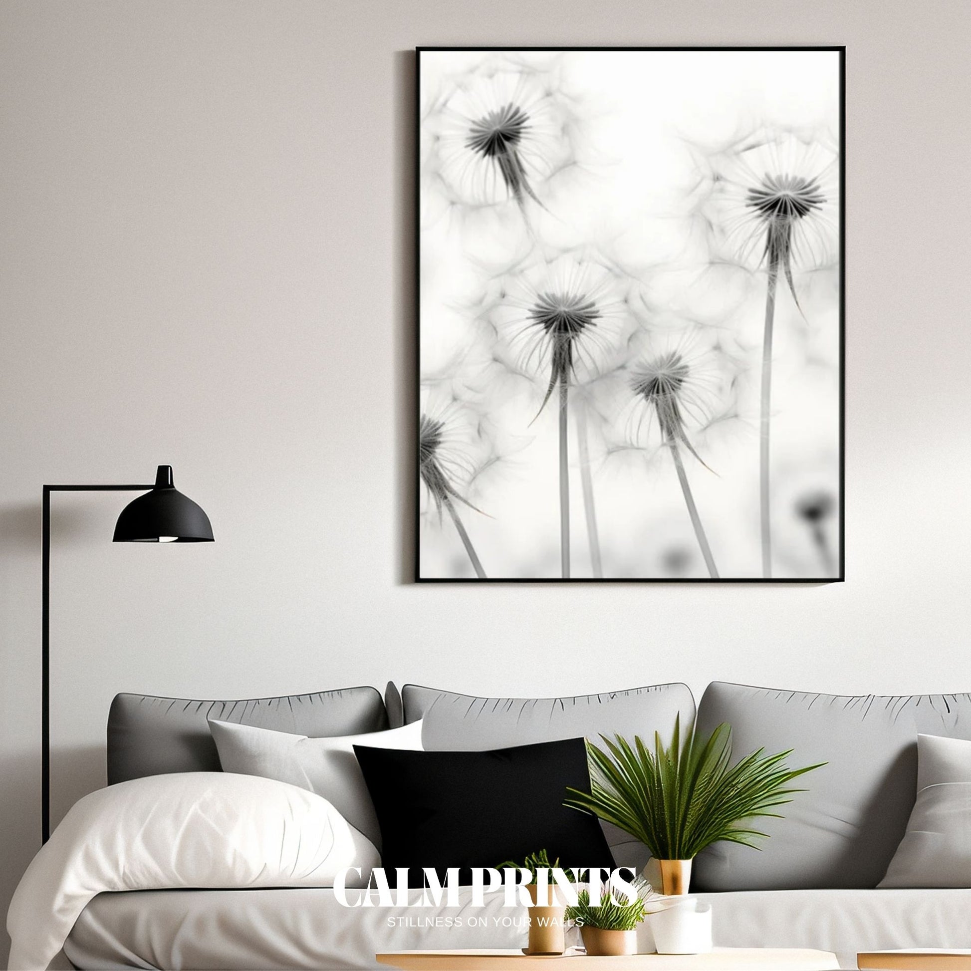 Fine line dandelion artwork featuring intricate monochrome seed structure