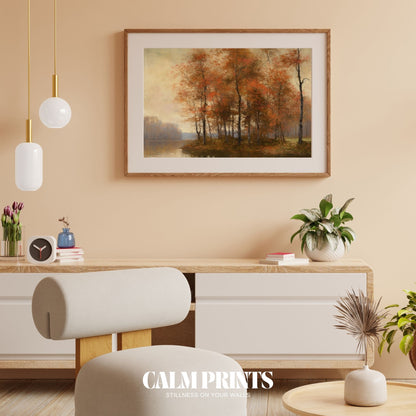 Golden trees meet the lake horizon in a serene autumn scene