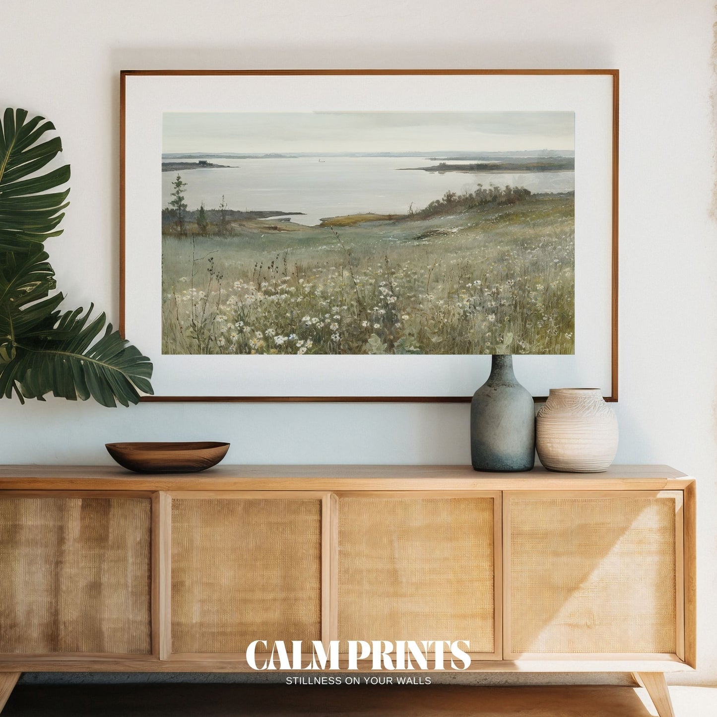 Artwork of a grassy meadow meeting the calm coastal horizon
