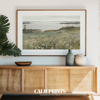 Artwork of a grassy meadow meeting the calm coastal horizon

