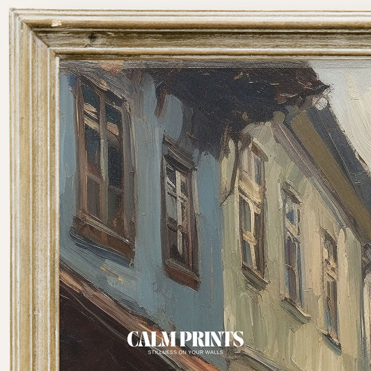 Print of a historic cobbled street lined with charming old buildings
