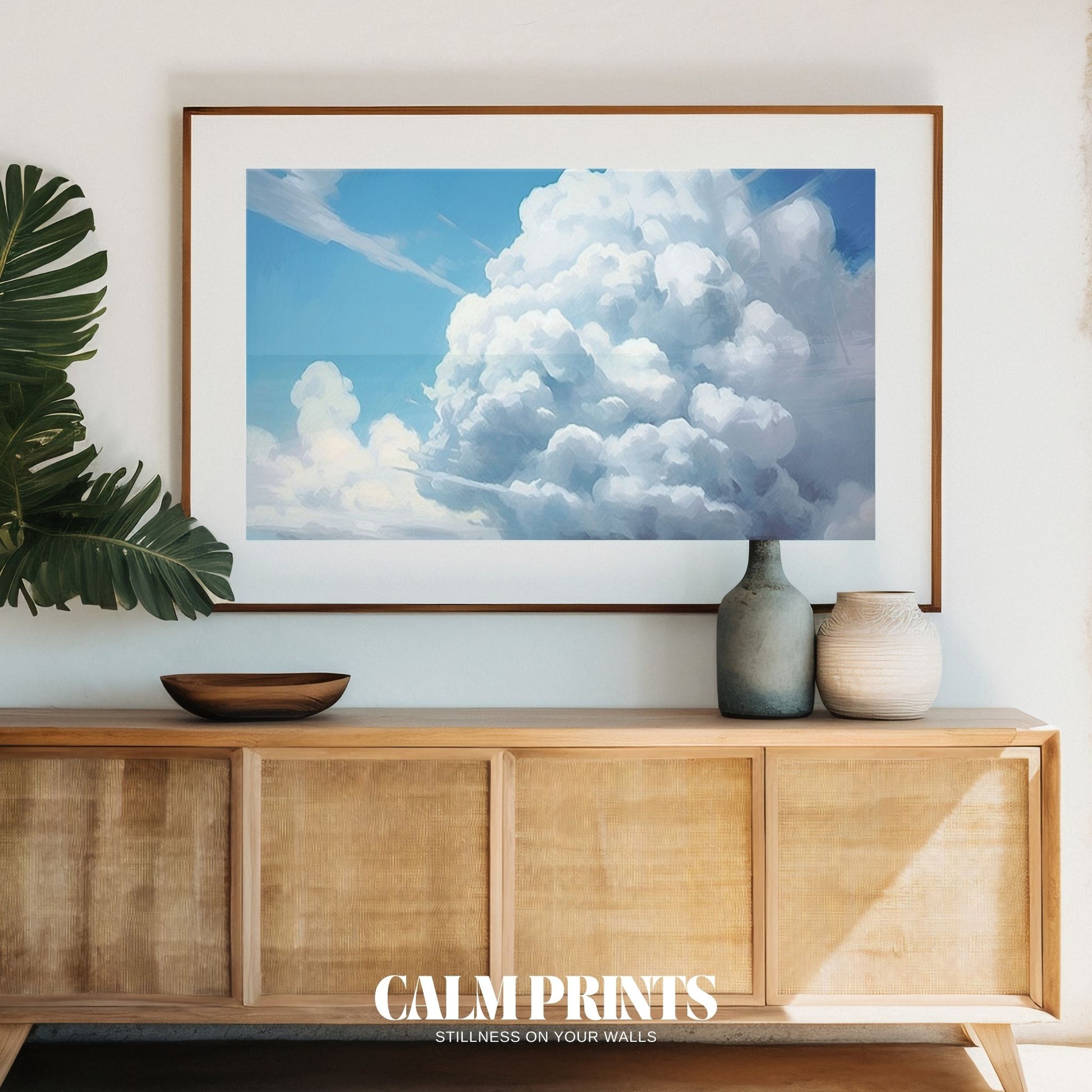 Light and airy clouds rolling through a calm, open blue sky