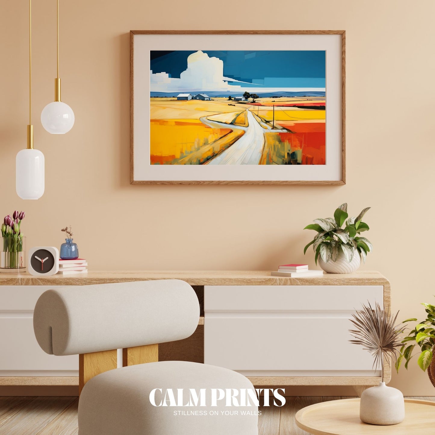 Print of a lush countryside view with a distant village and flowering fields
