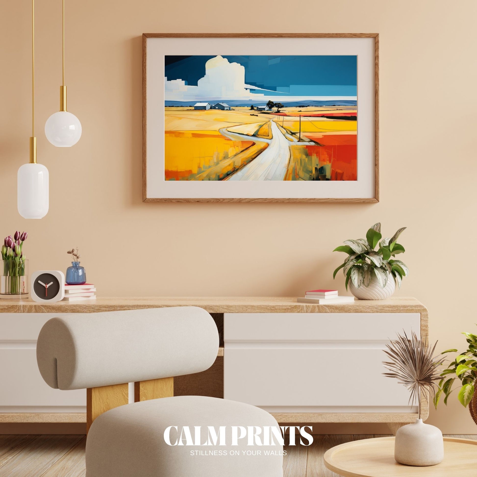 Print of a lush countryside view with a distant village and flowering fields
