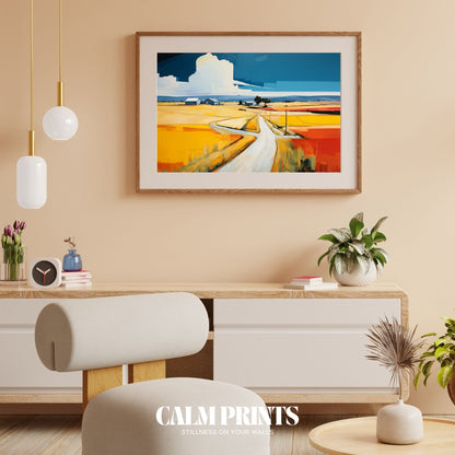 Print of a lush countryside view with a distant village and flowering fields
