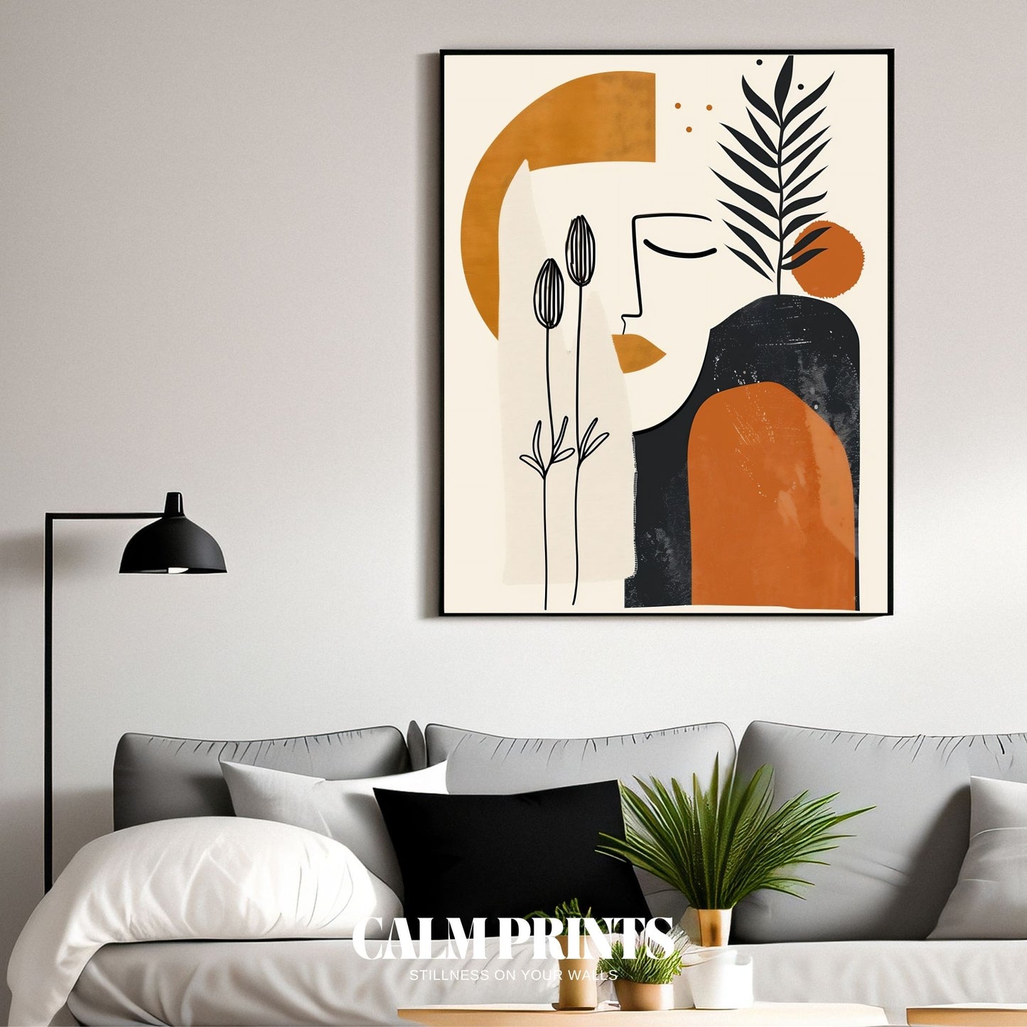 Modern abstract outline of a woman blended with leafy motifs