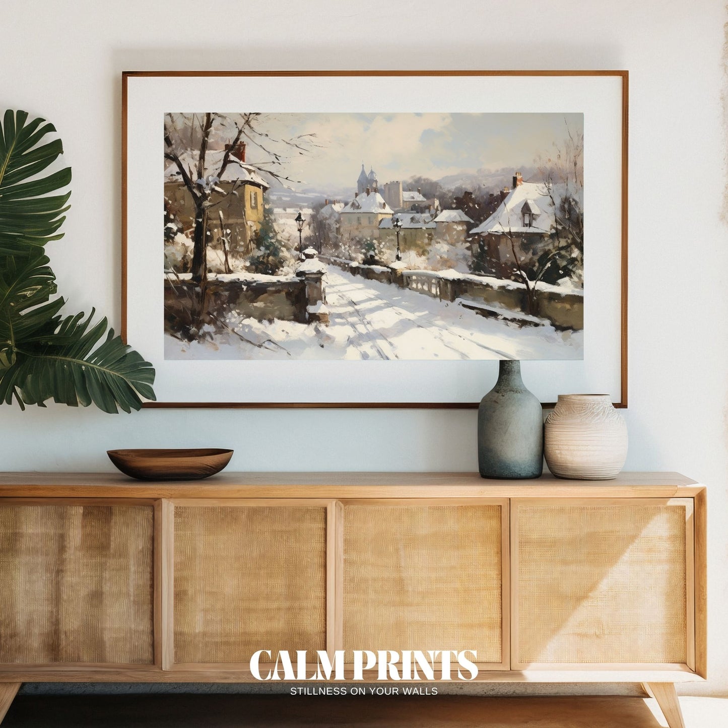 Peaceful winter village at the foot of snowy hills and mountains
