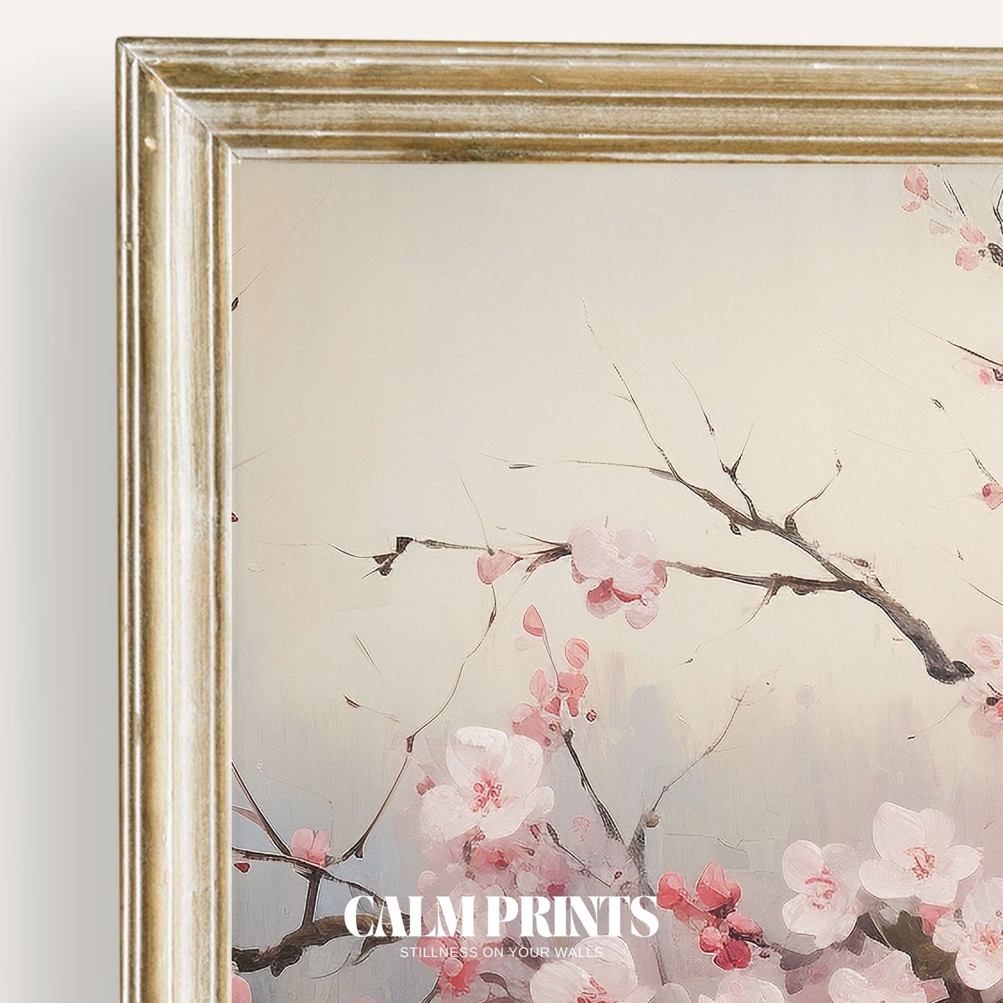 Print of soft pink cherry blossoms hanging gracefully over still water
