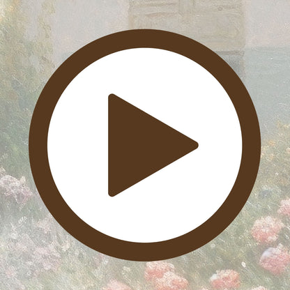 Country garden in bloom with a rustic cottage and vibrant floral borders