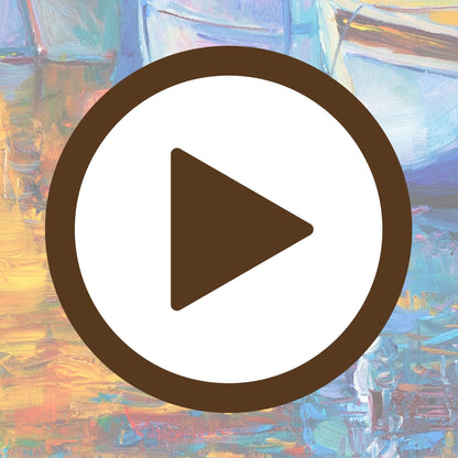 Sunlit boats gently floating with their reflections on a calm harbour surface

