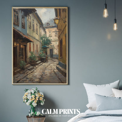 Quiet cobblestone alleyway tucked between warm-toned façades
