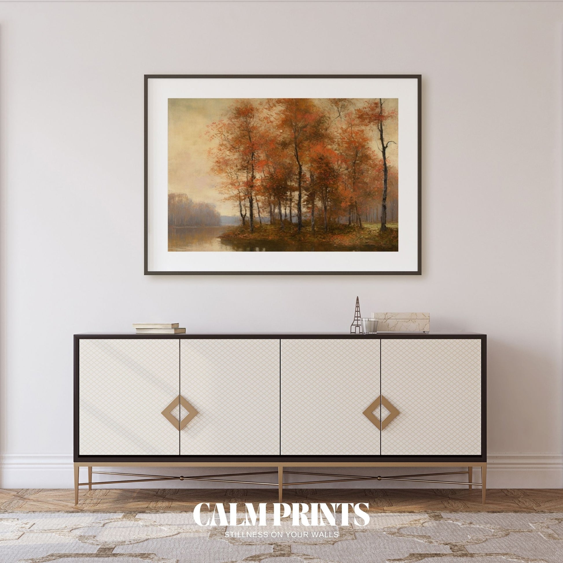 Reflections of autumn trees dancing gently on a still lakeside surface