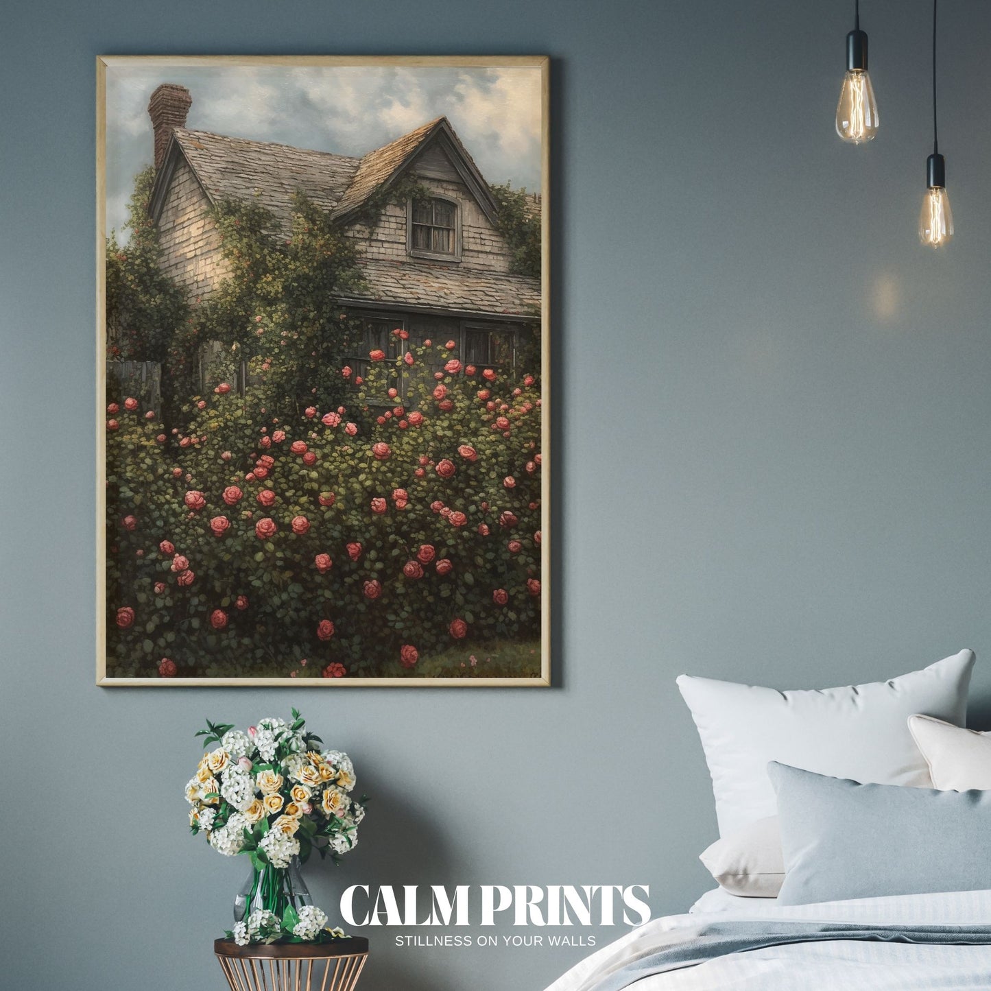 Artwork of a cottage with vibrant roses blooming around the doorway
