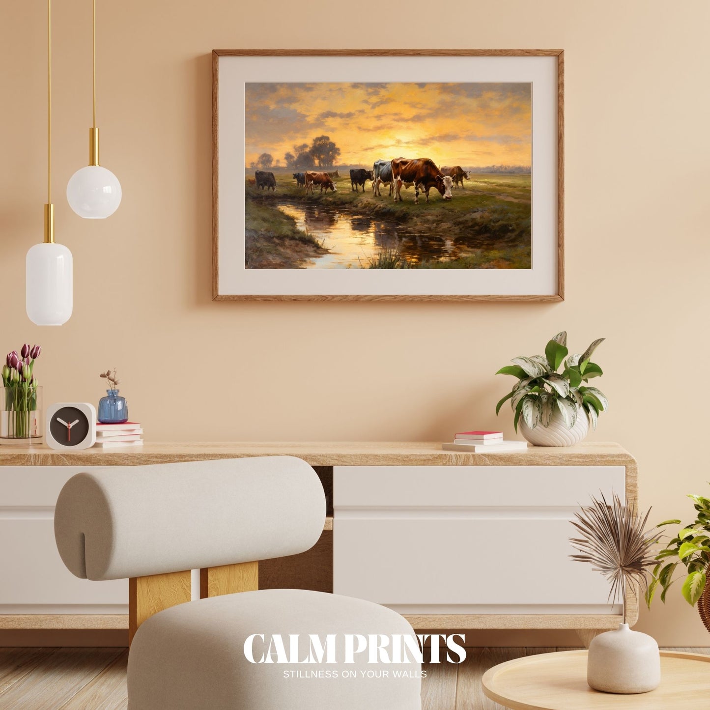 Rural landscape artwork showing cows at ease as the sun sets behind them
