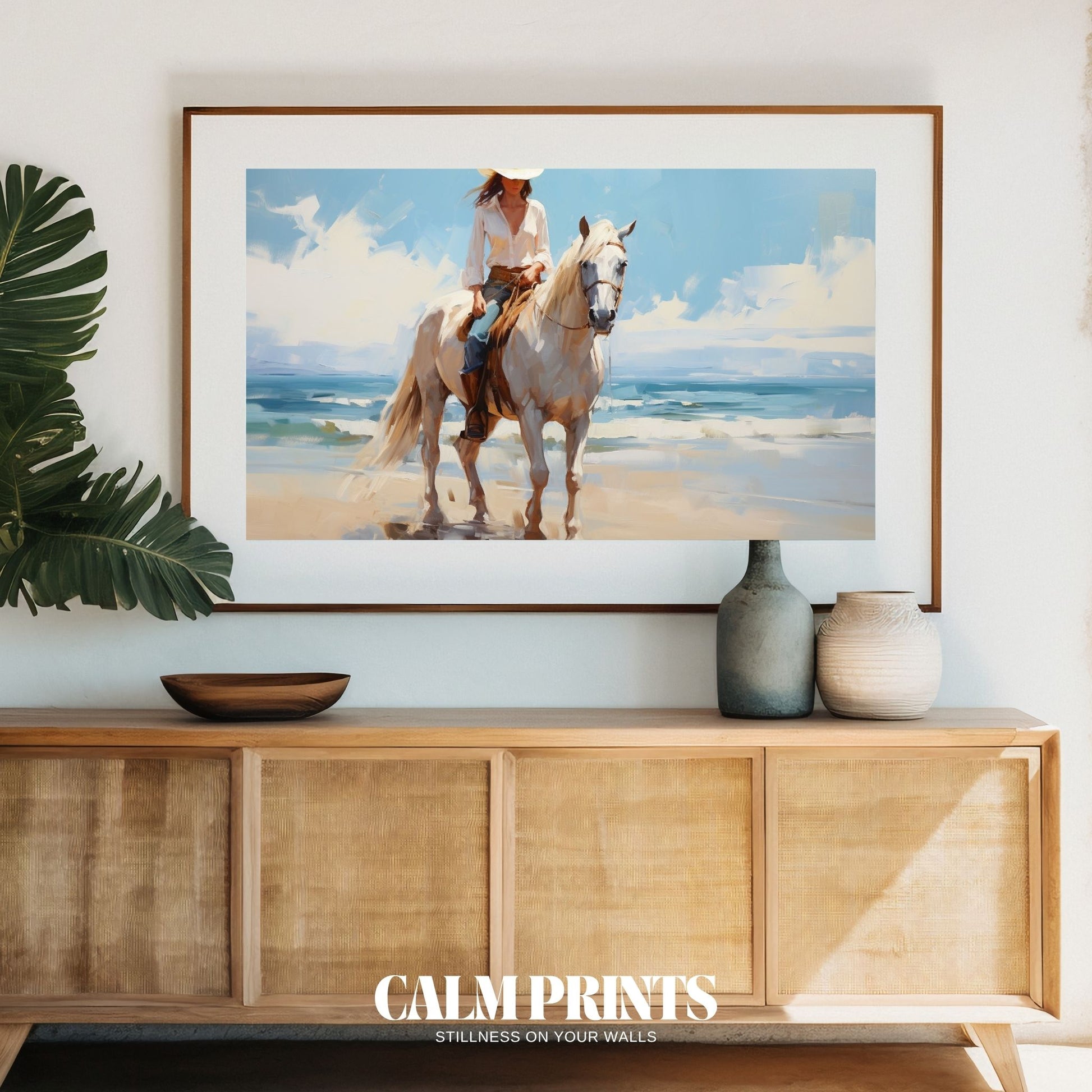 Artwork of a western cowgirl enjoying a serene seaside ride under clear skies
