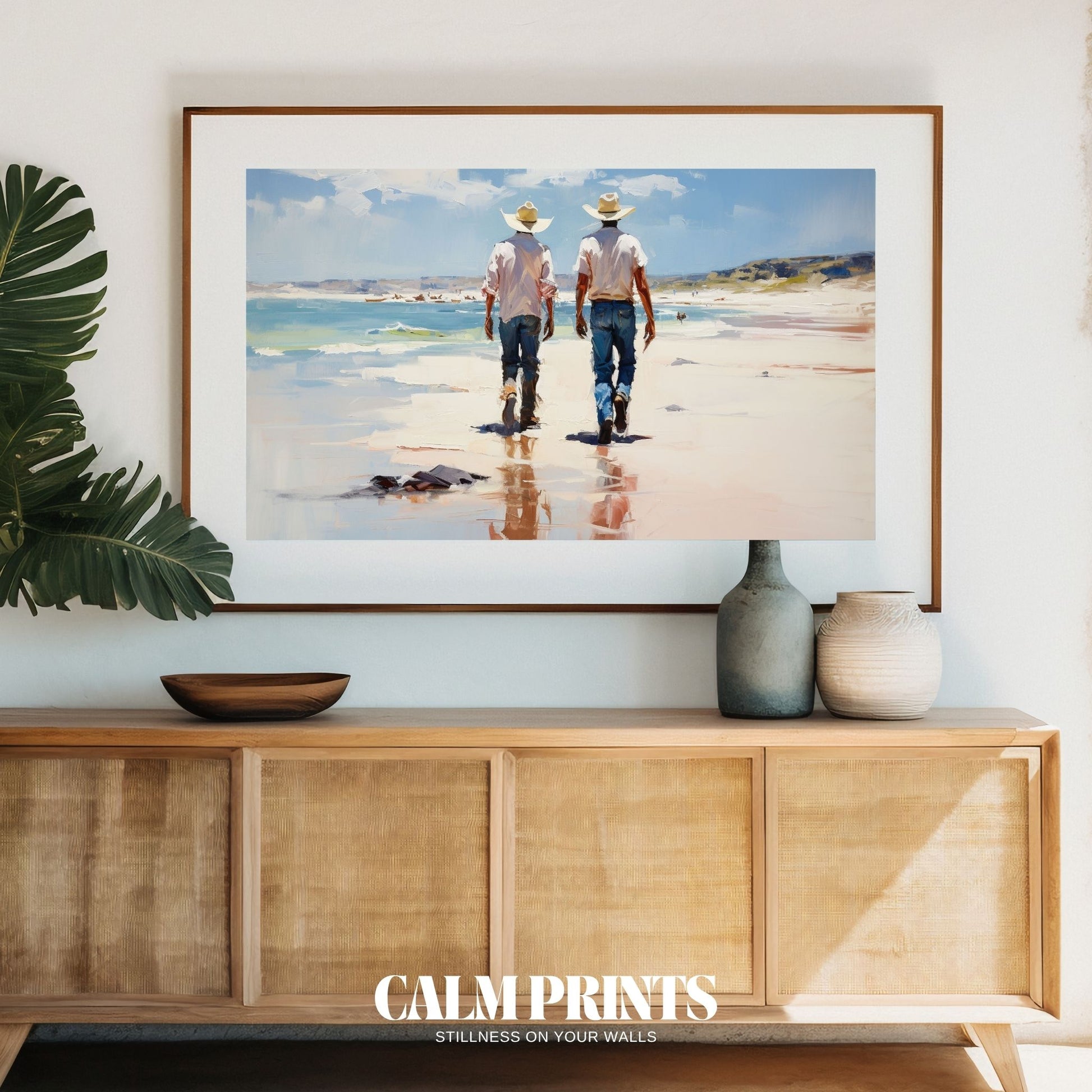 Silhouetted cowboys strolling peacefully along a reflective shoreline

