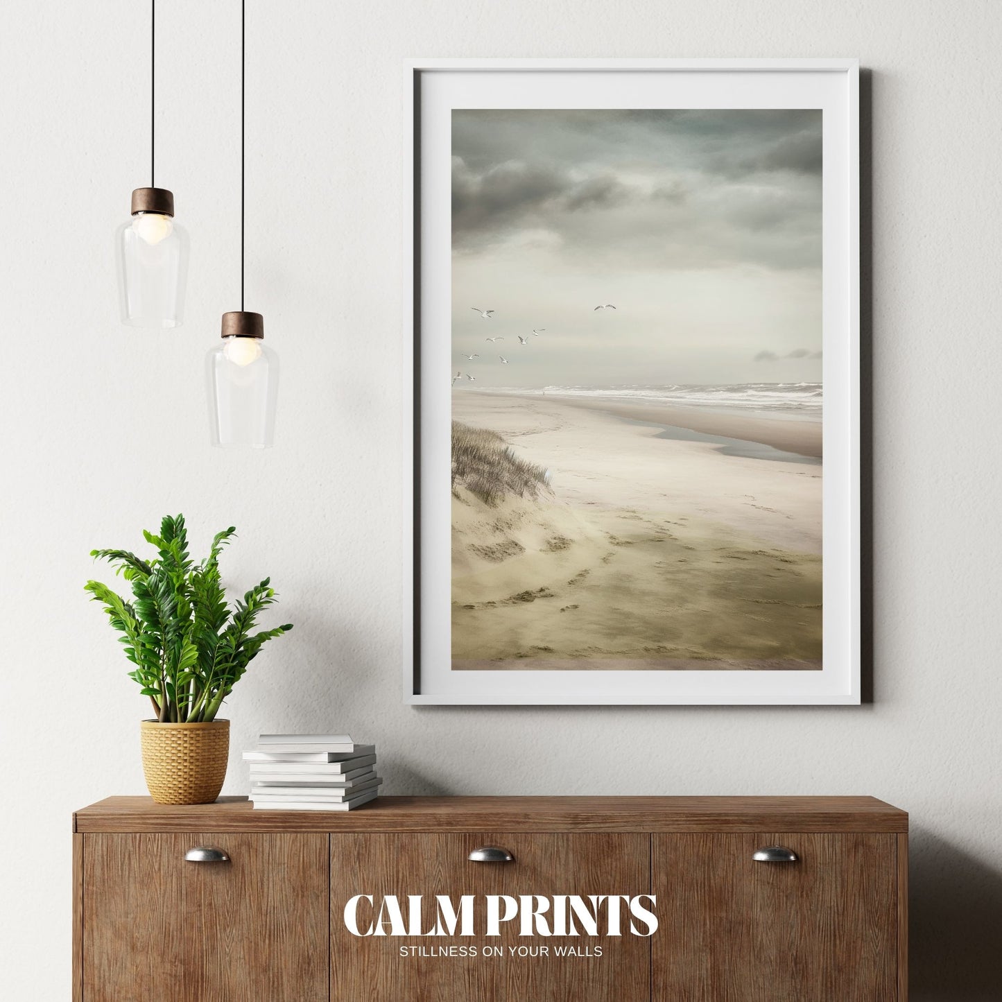 Soft seaside sky with graceful seagulls drifting above the water
