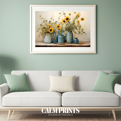 Artwork of sunny flowers in blue jars capturing warmth and colour

