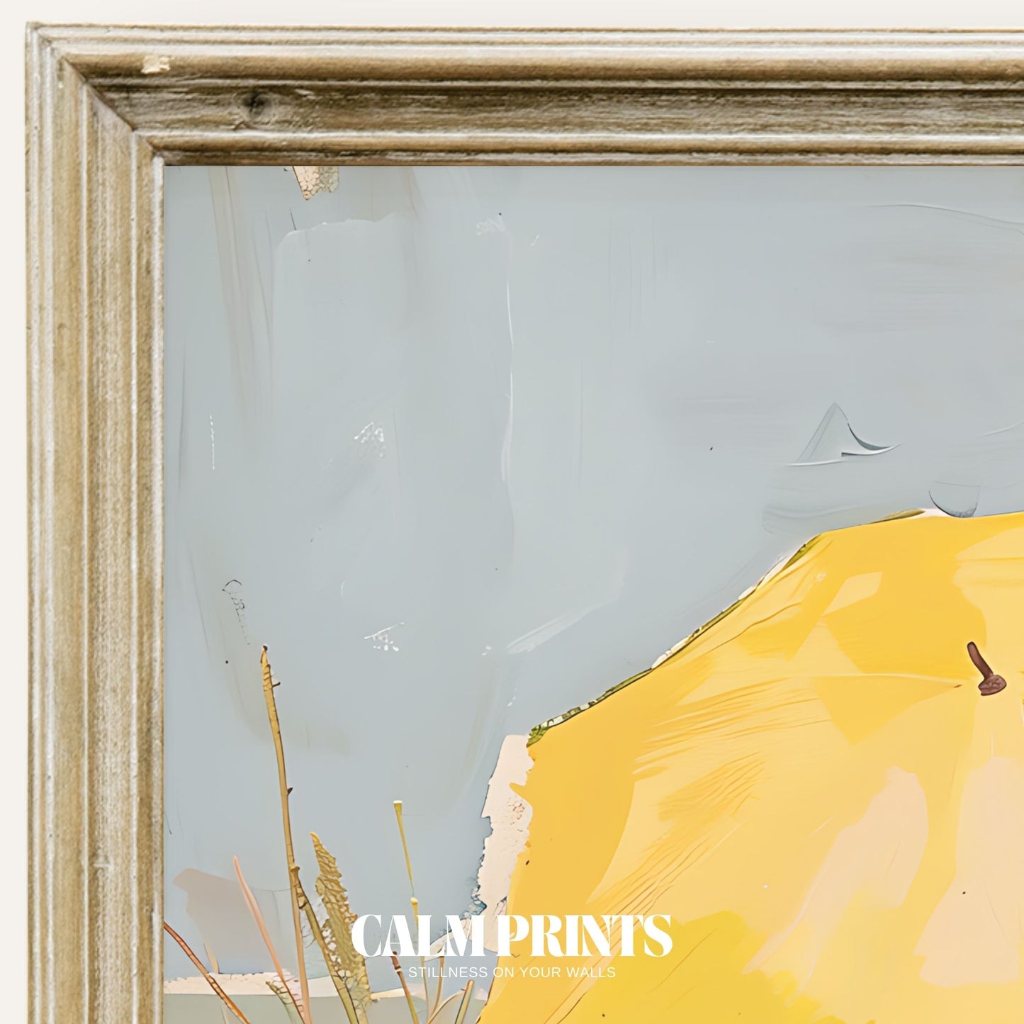 Sunlit beach walk featuring a vibrant yellow umbrella against soft sand