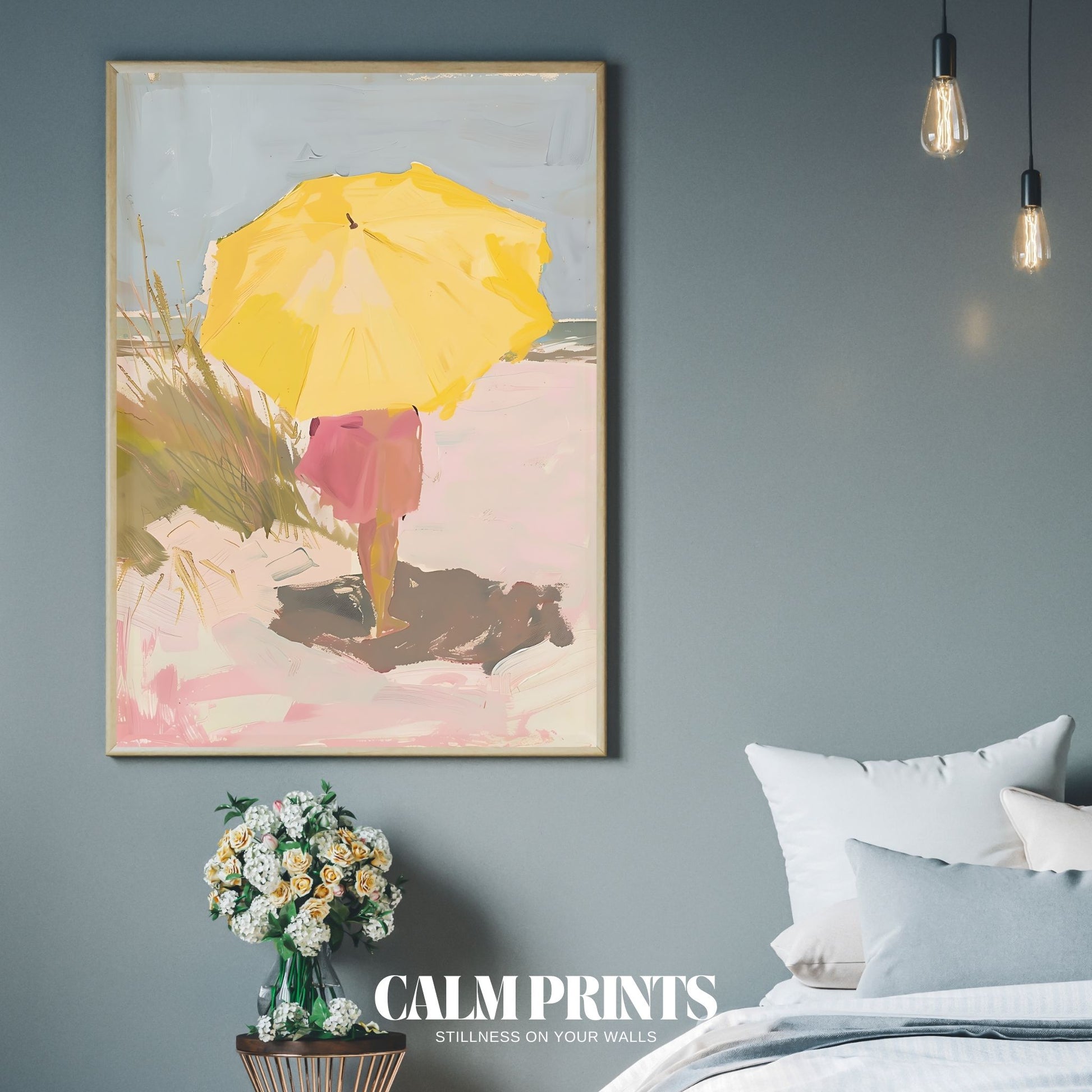 Scene of a gentle beach walk with the pop of a yellow umbrella