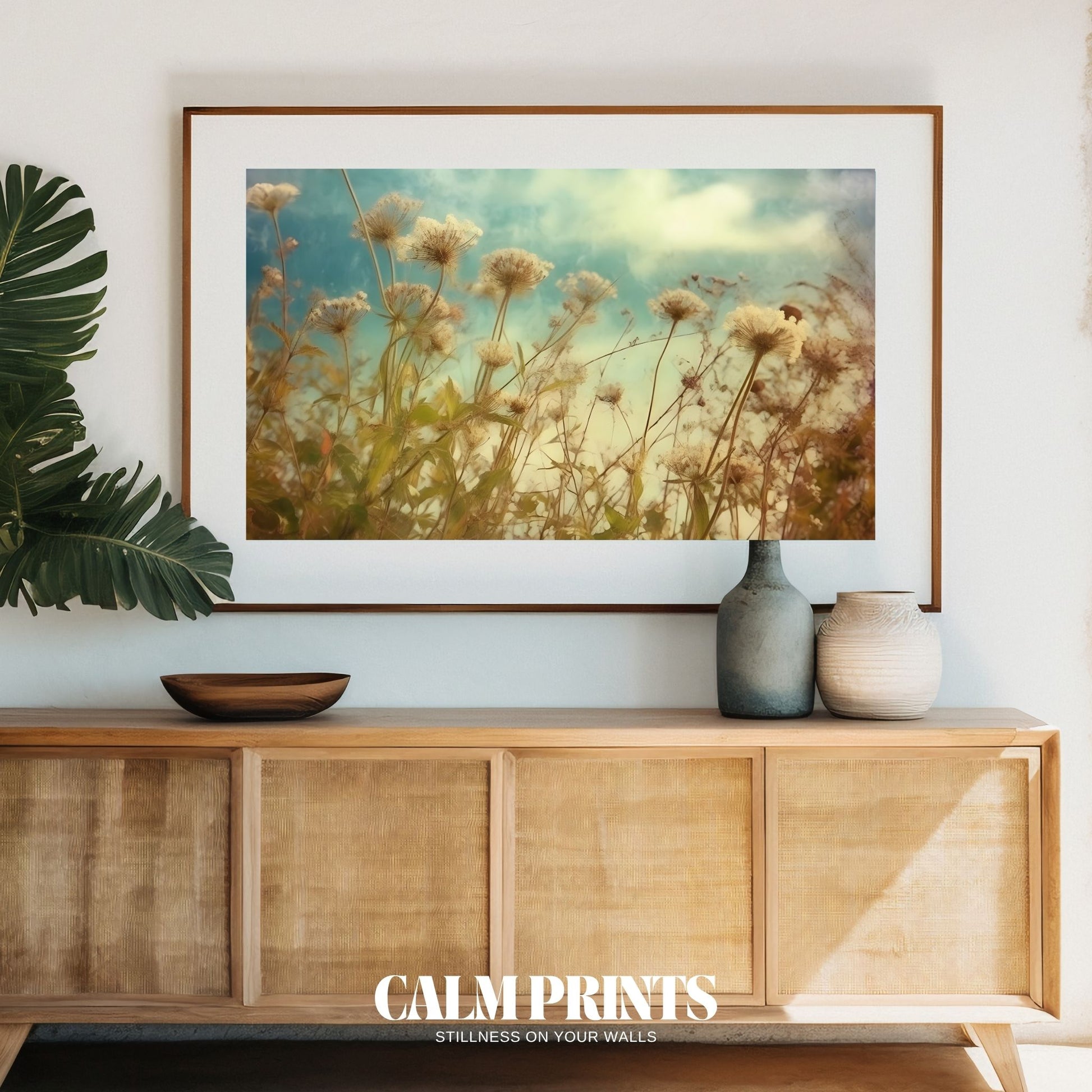 Whimsical field of flowers beneath a bright and cheerful sky
