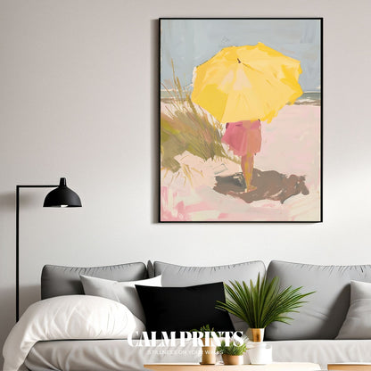 Art print of a yellow umbrella strolling along the calm seaside shore